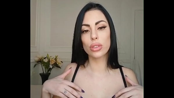 Horny brunette putting her favorite toy in her pussy while moaning